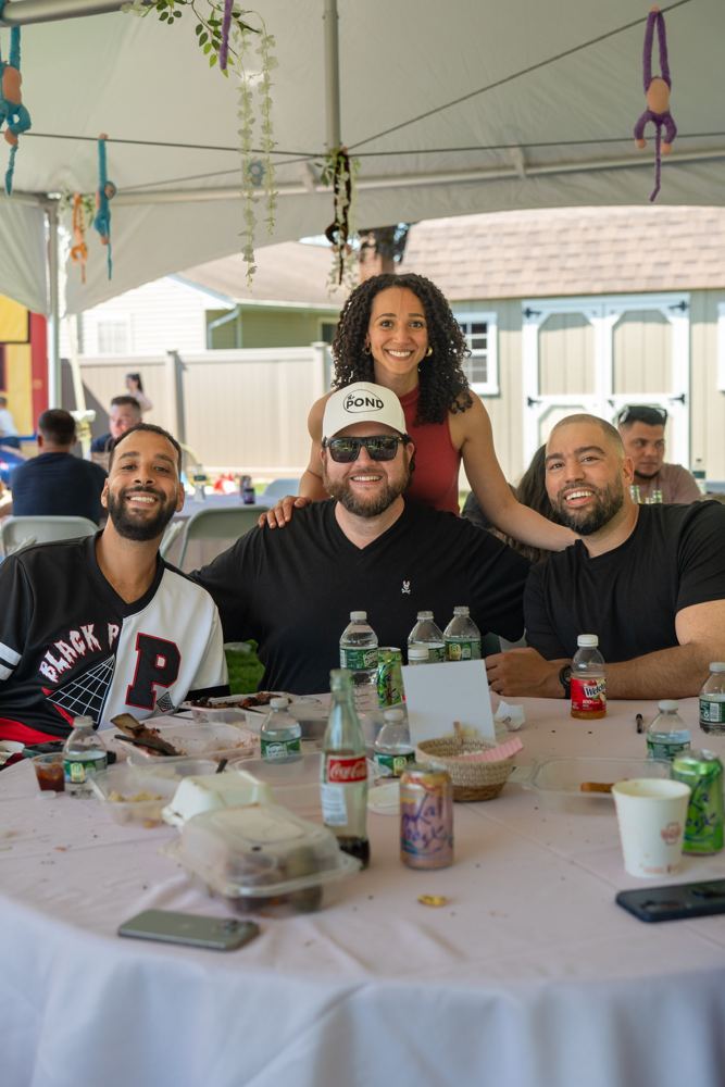 Members together at an outdoor Pond gathering